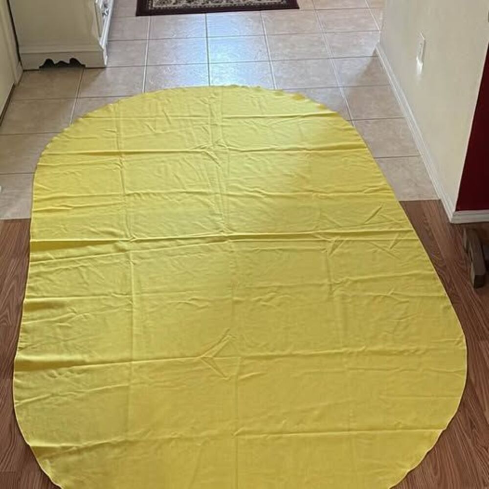 Medium size oval yellow table cloth in cotton